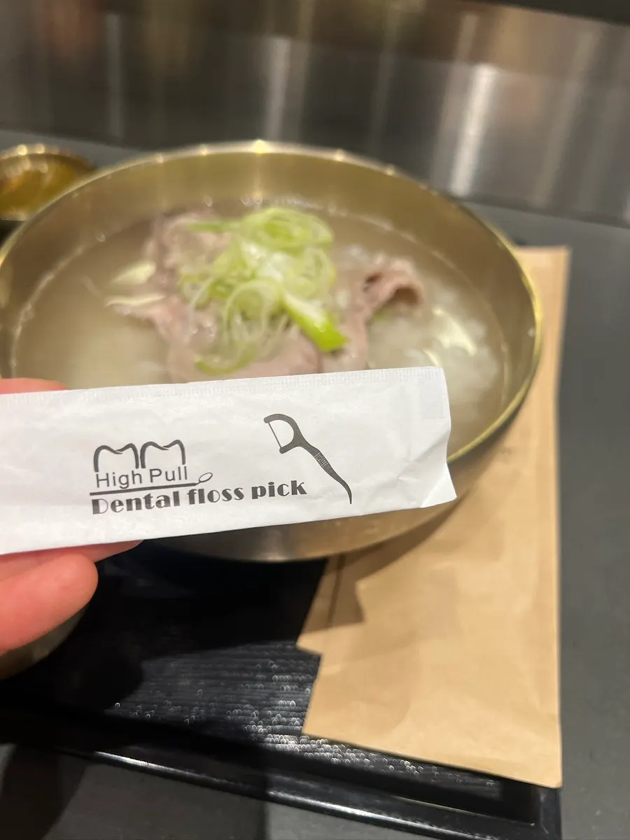 Broth and meat in Baekok's pork gomtang