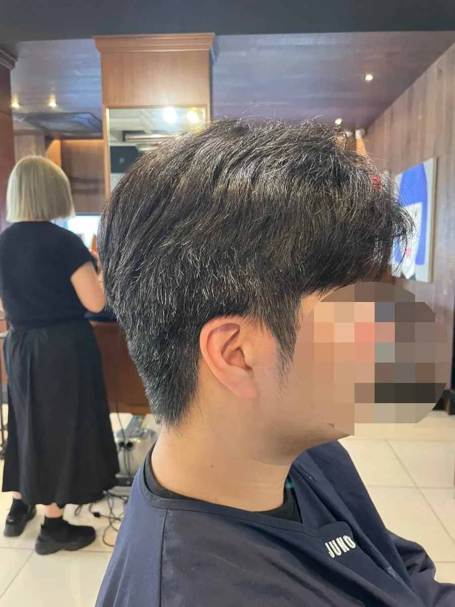 Side hair sitting calmly after the down perm