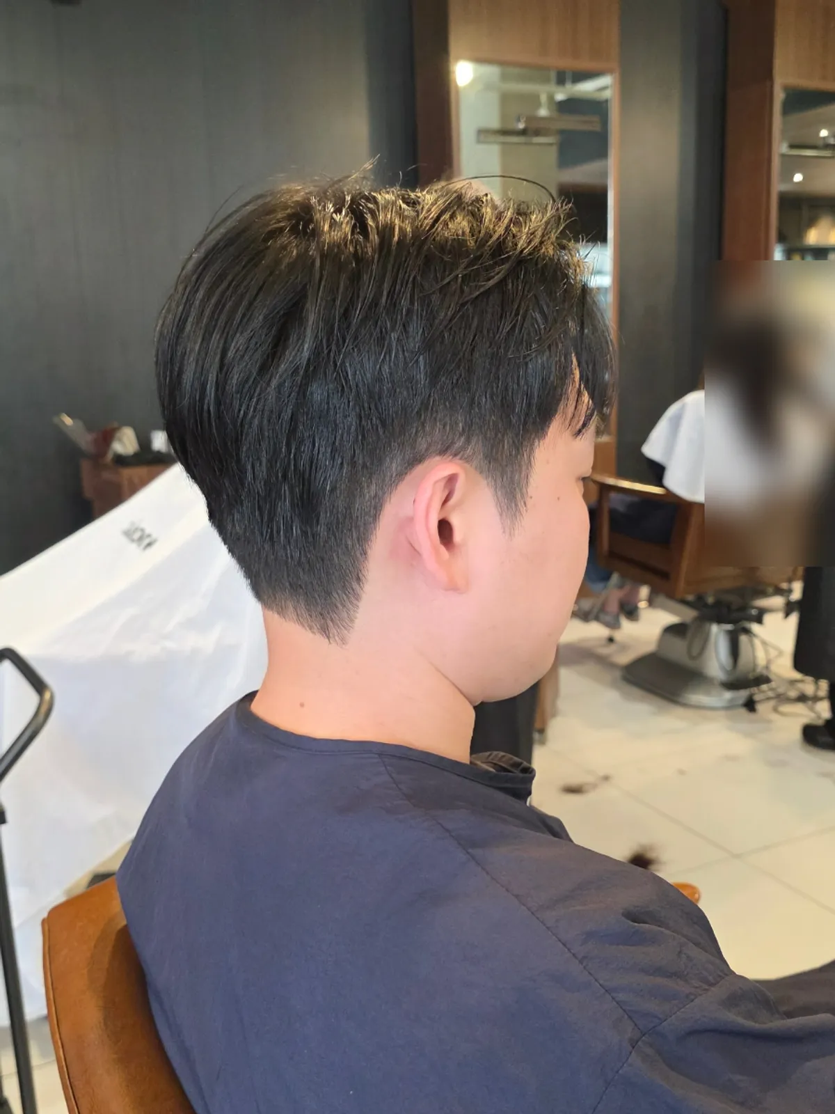 Visiting to tidy my husband’s hair before the first-birthday photo shoot