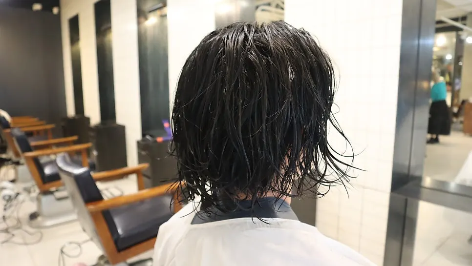 Mid-length hairstyle cleaned up after treatment