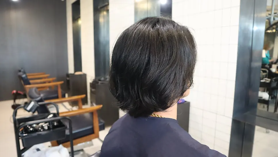 Front view of the tidied mid-length style