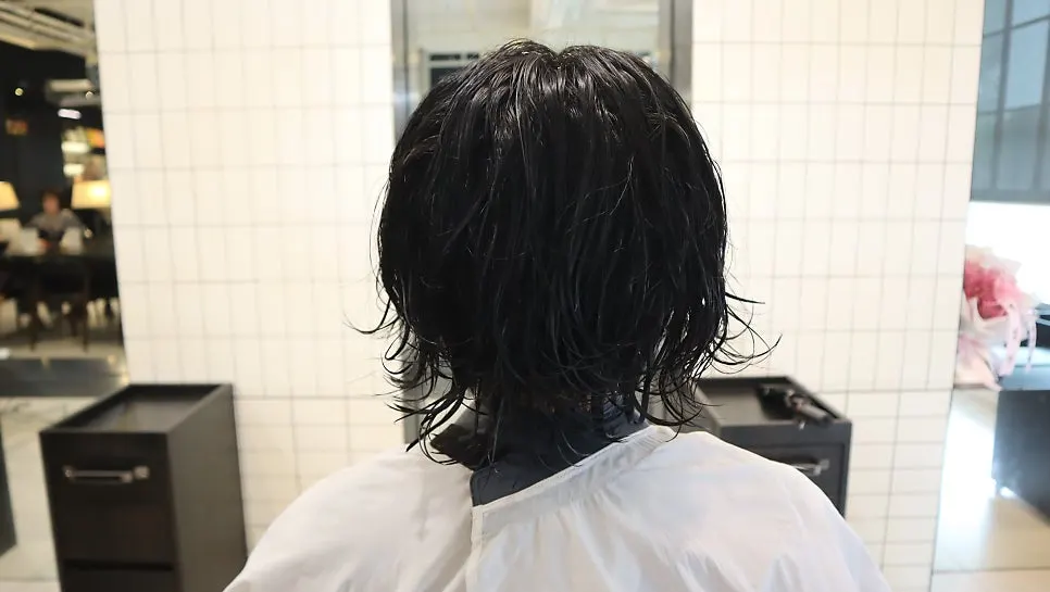 Calmer side silhouette after the down perm