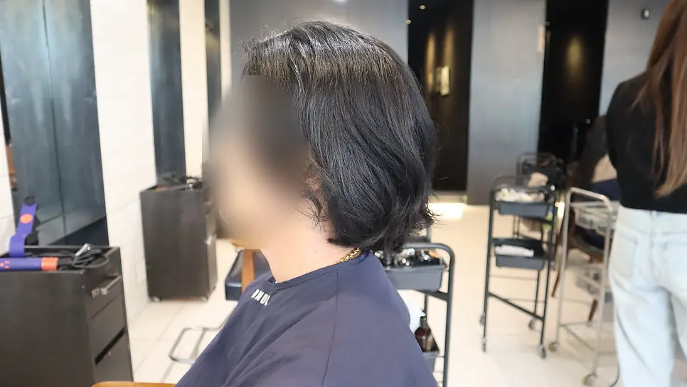 Tidied mid-length hair after the treatment