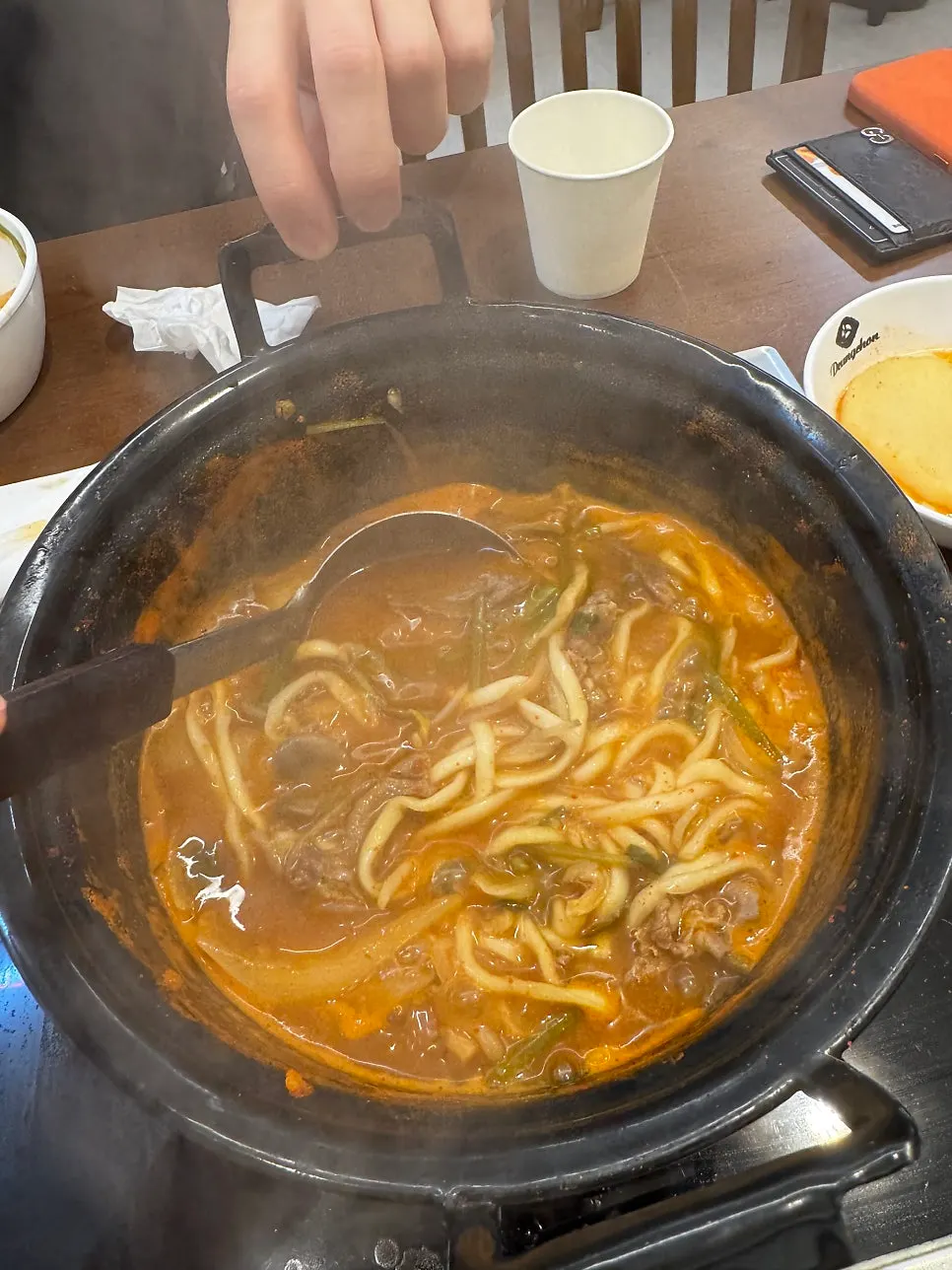 Dumpling noodles soaked in spicy broth