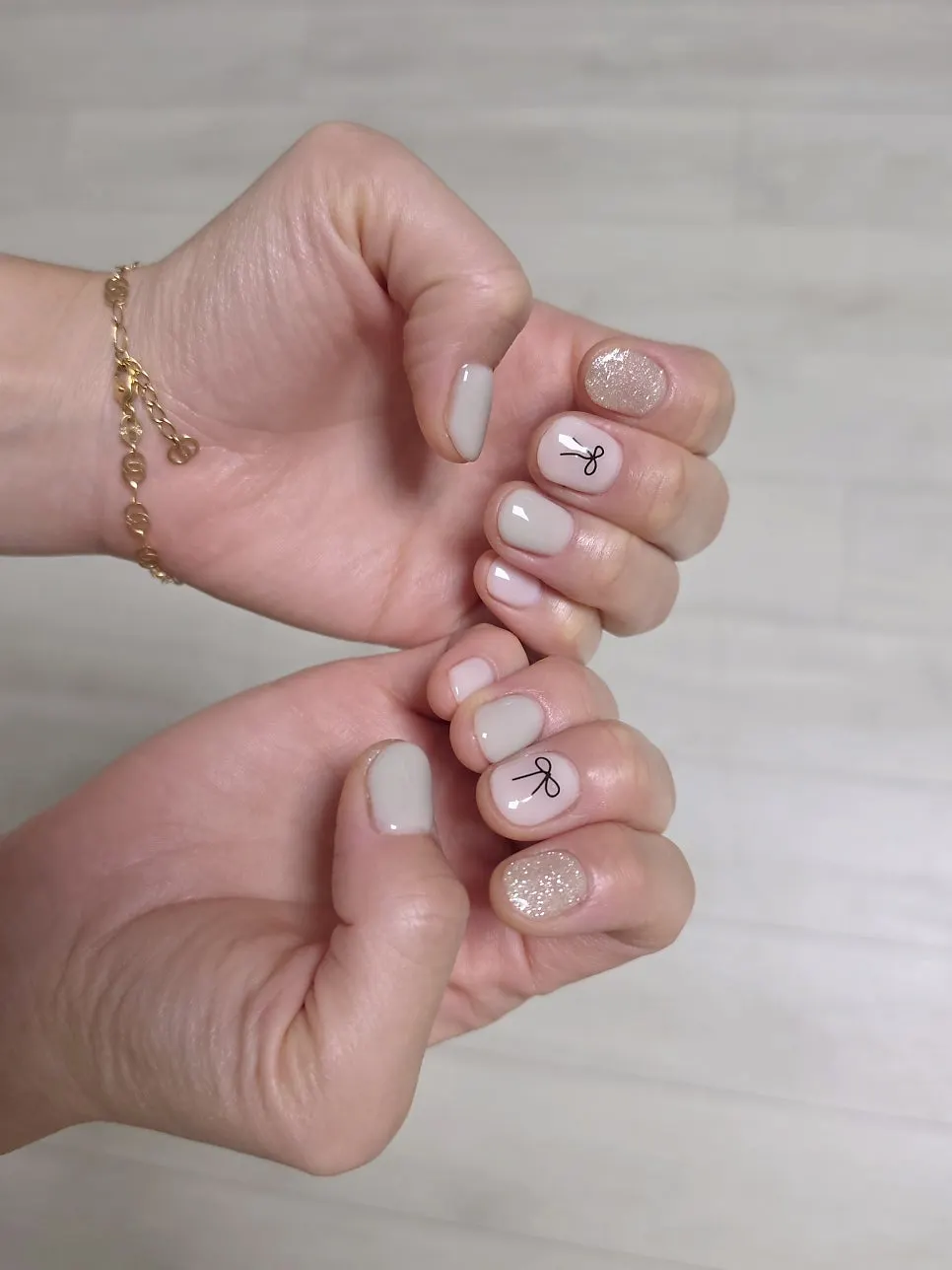 Finished mint nails with ribbon accents