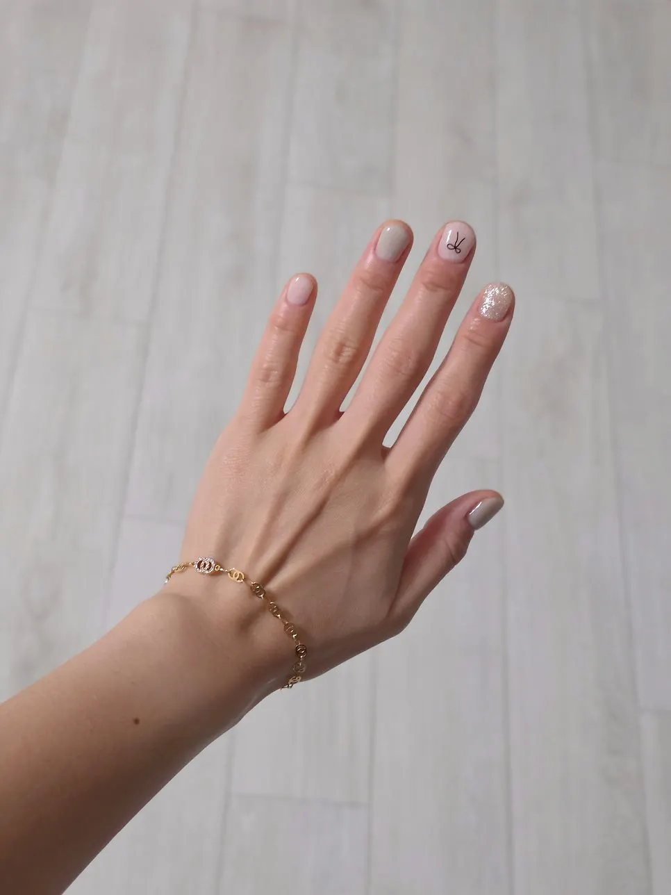 Mint gel nail design with pearl