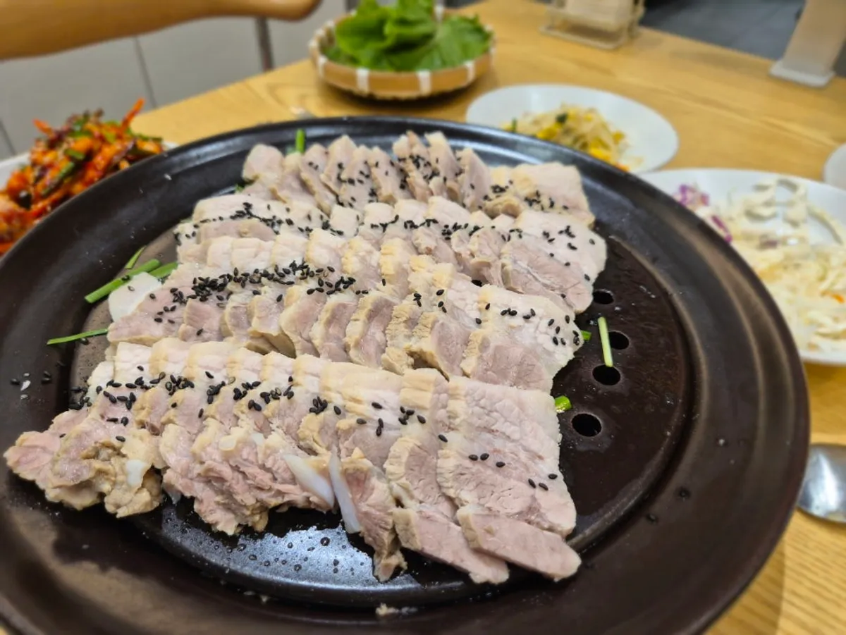 Various side dishes served with the bossam
