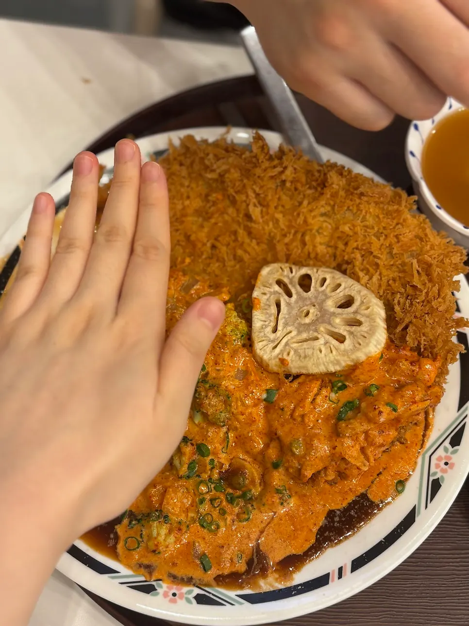 A large pork cutlet filling the plate