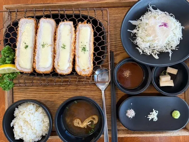 A plate of Kkot Gatsu's cheese cutlet