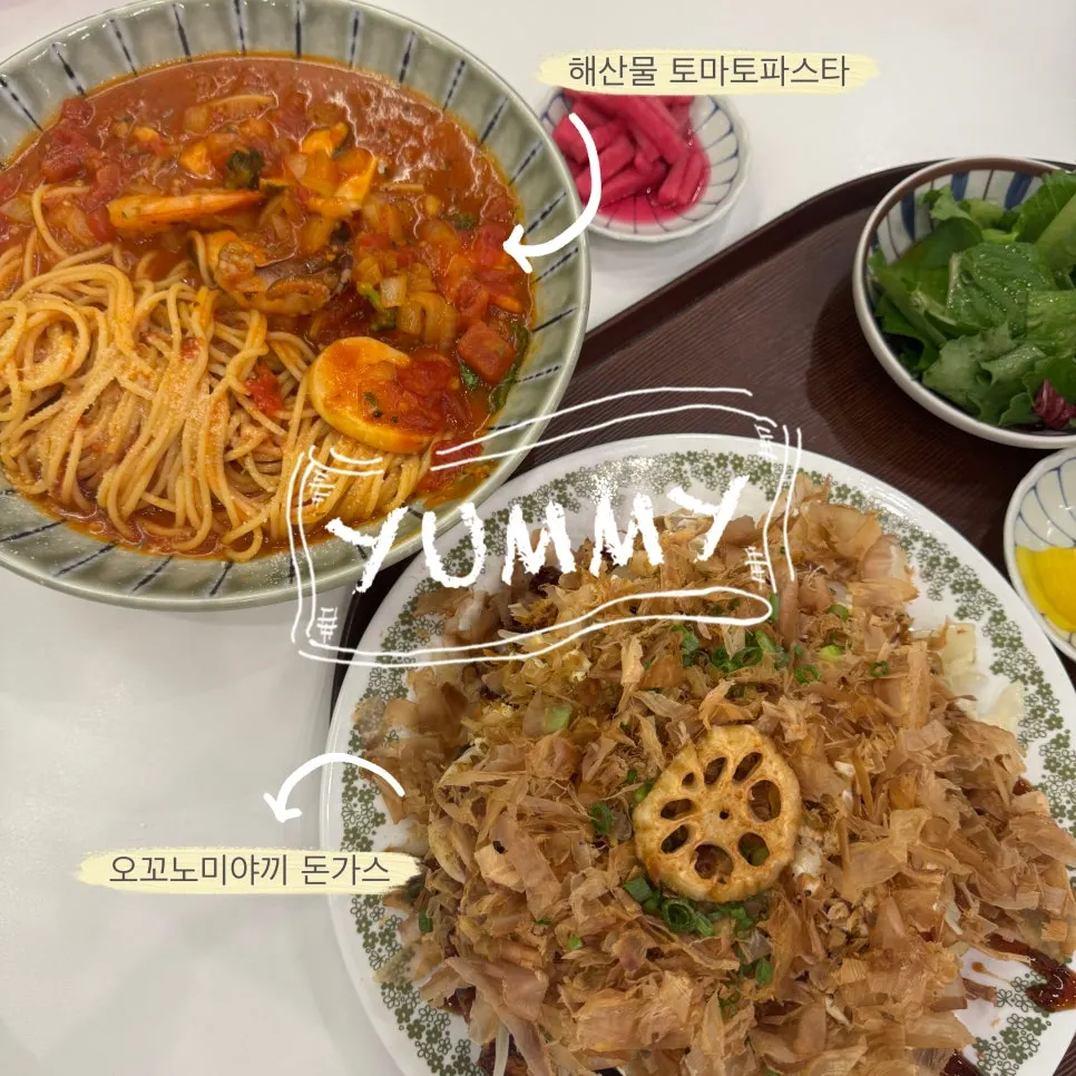 Okonomiyaki pork cutlet and seafood tomato pasta served together