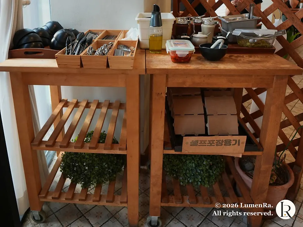 Self-serve area for utensils and sauces