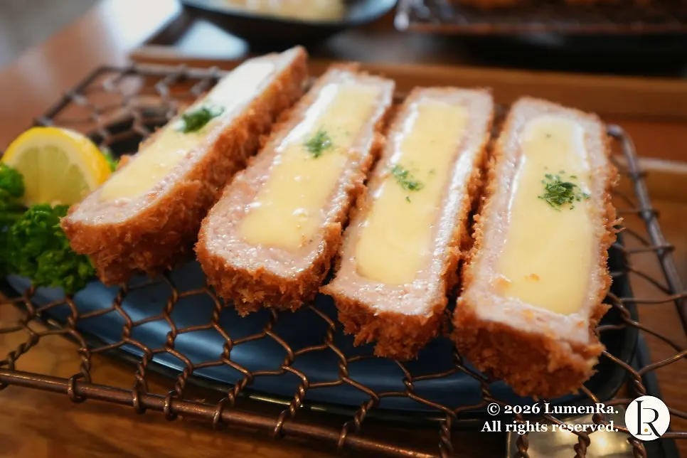 Cross-section of cheese cutlet packed with cheese