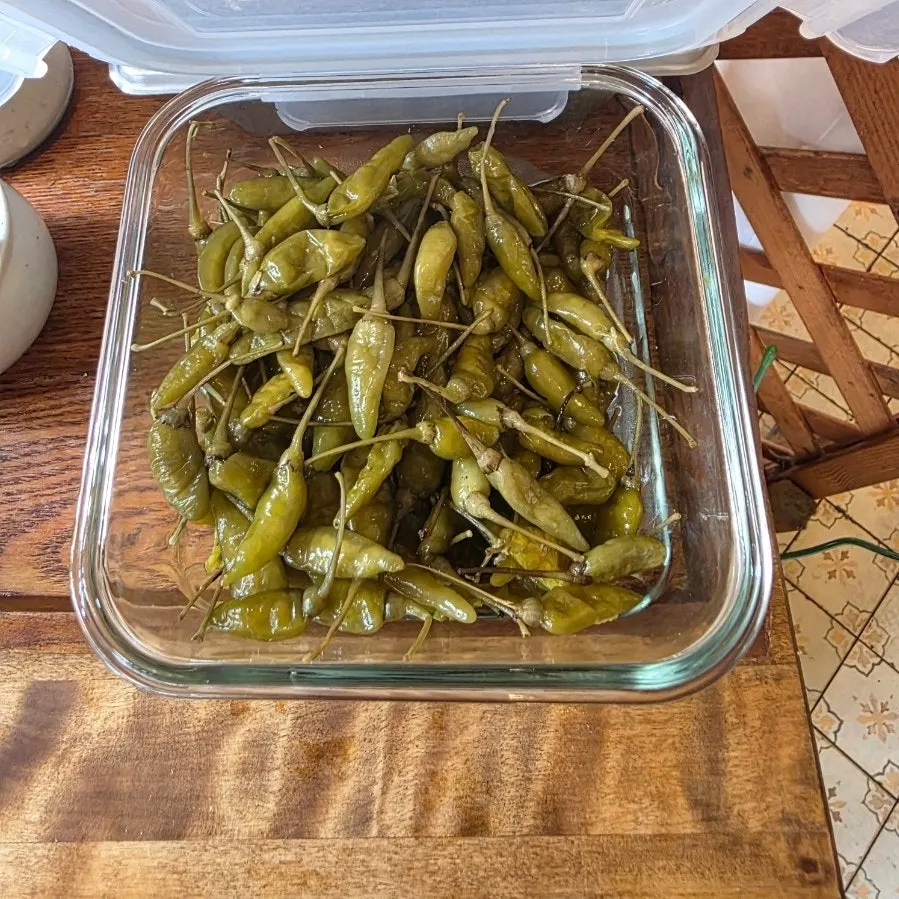 House-made pickles at the self-serve corner