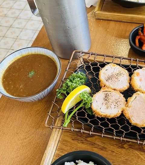 A piece of cutlet dipped in salt