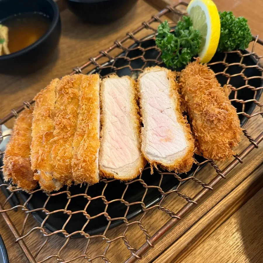Loin cutlet with crispy breading served on a plate