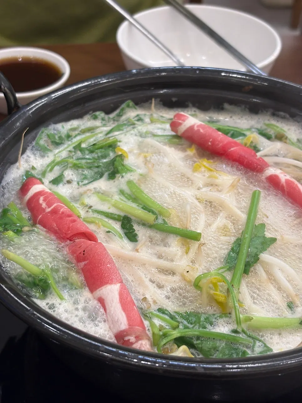 Bowl of clear broth shabu hot pot