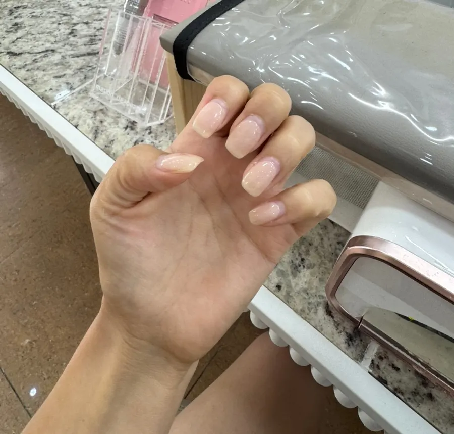Existing gel nails grown out long before care