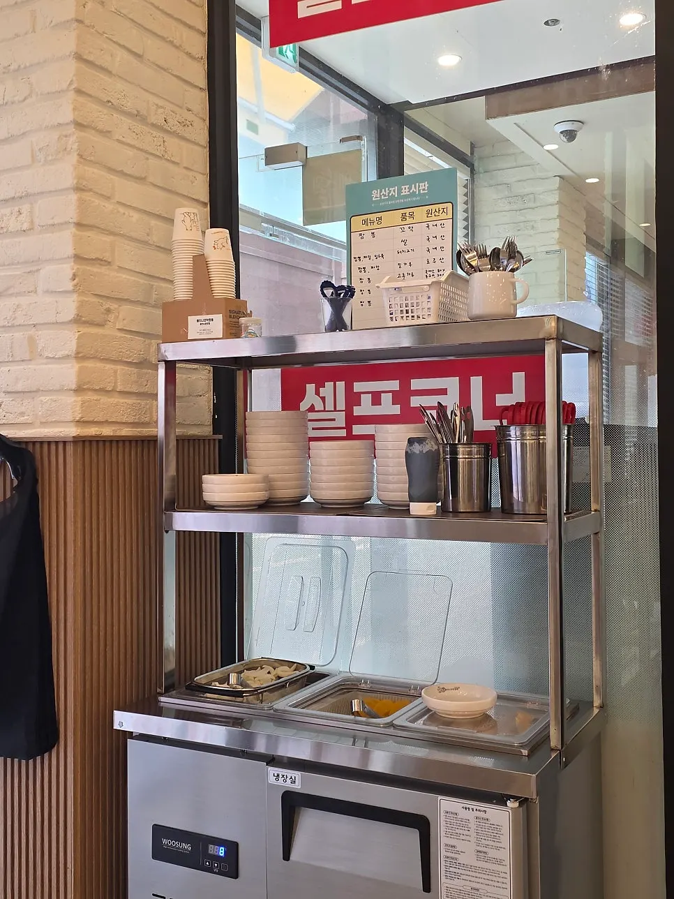 Long window table with a tablet ordering device on it