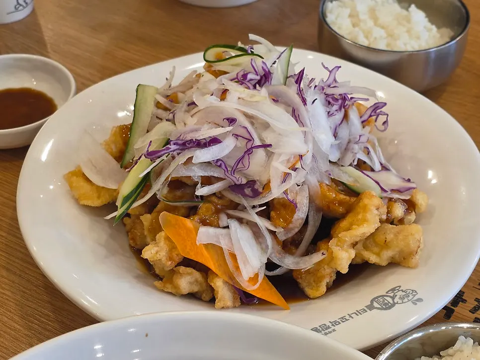 A bowl of rice mixed with jajang sauce