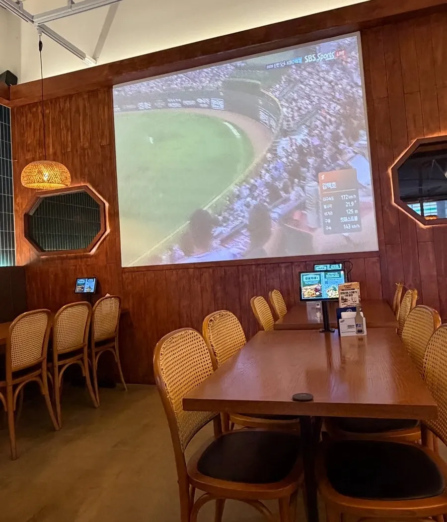 Hall seating with a large screen