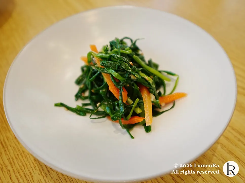 Seasoned spinach side dish served with the Ossam set meal