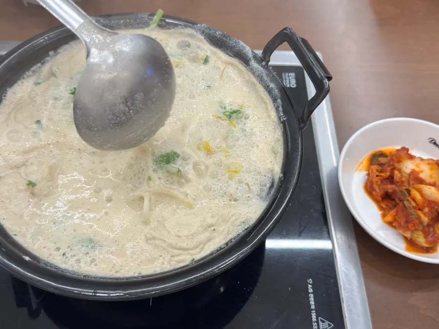 Family meal of perilla seed kalguksu and rice balls