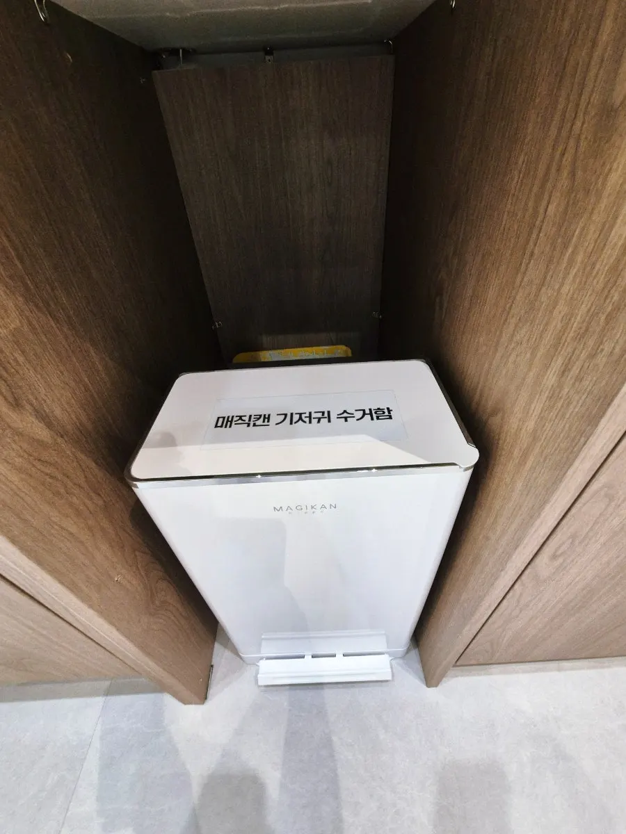 Diaper-changing table and nursing space