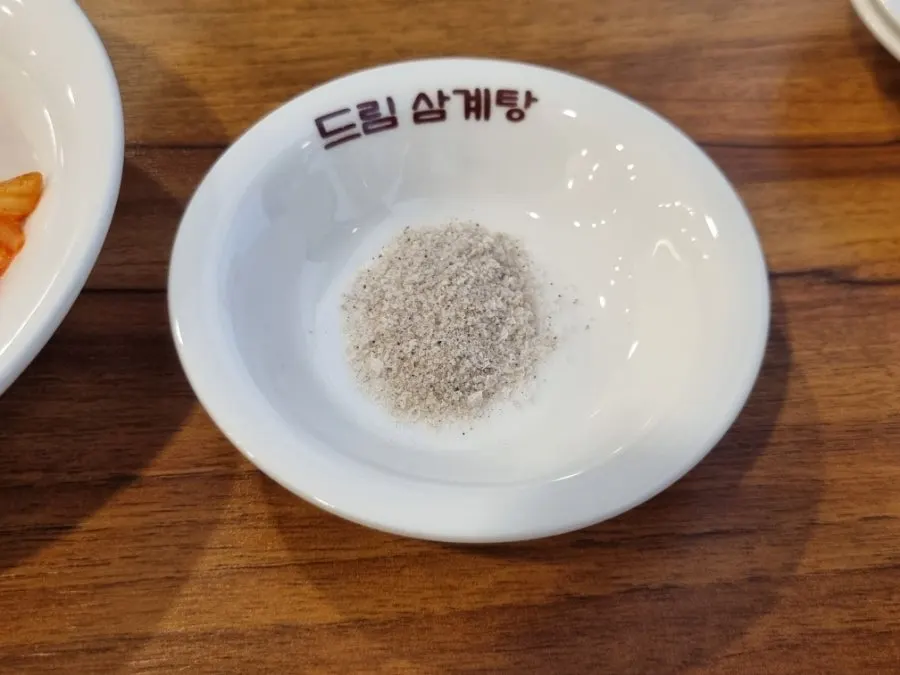 Small dish of salt for dipping the chicken