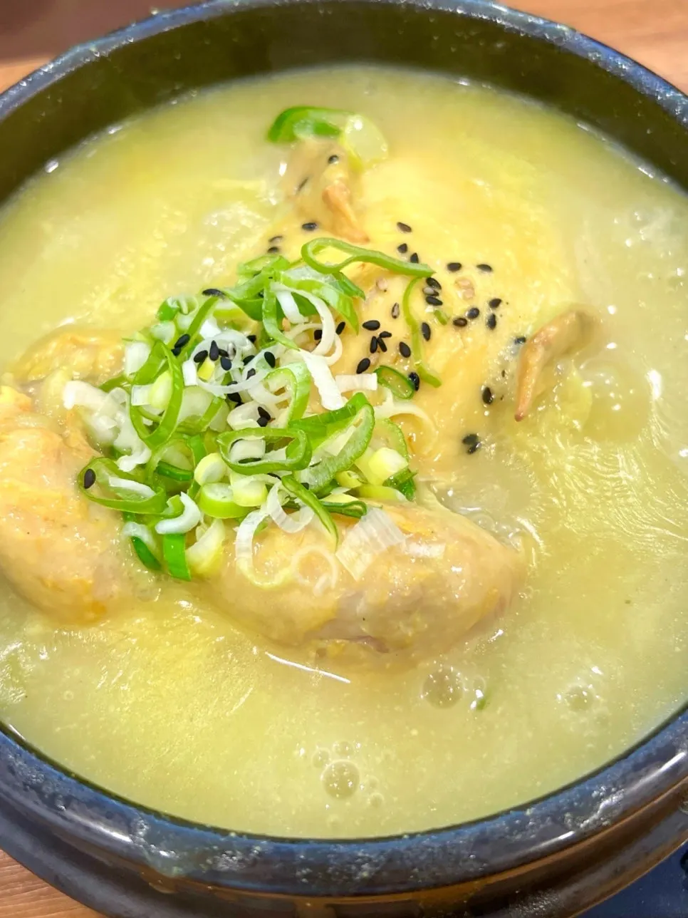 Dream Samgyetang's turmeric-yellow broth