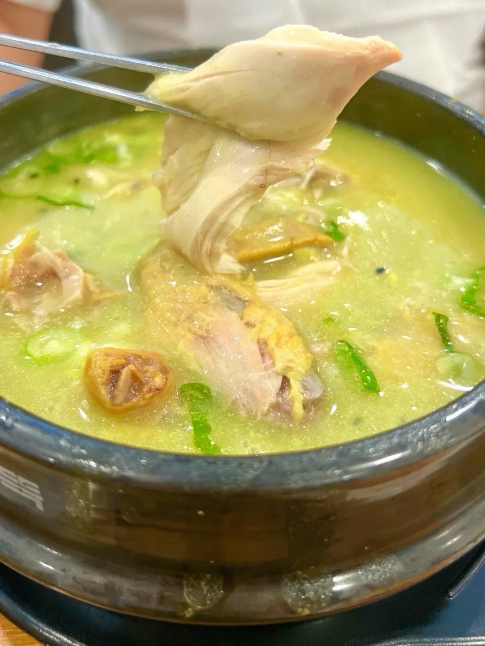 Chicken meat pulling apart along the grain
