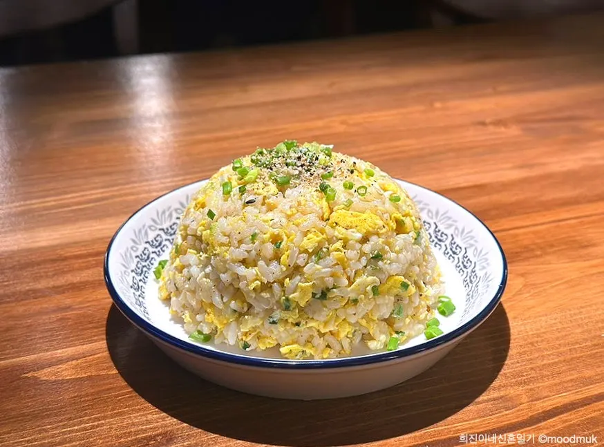Close-up of a bowl of egg fried rice