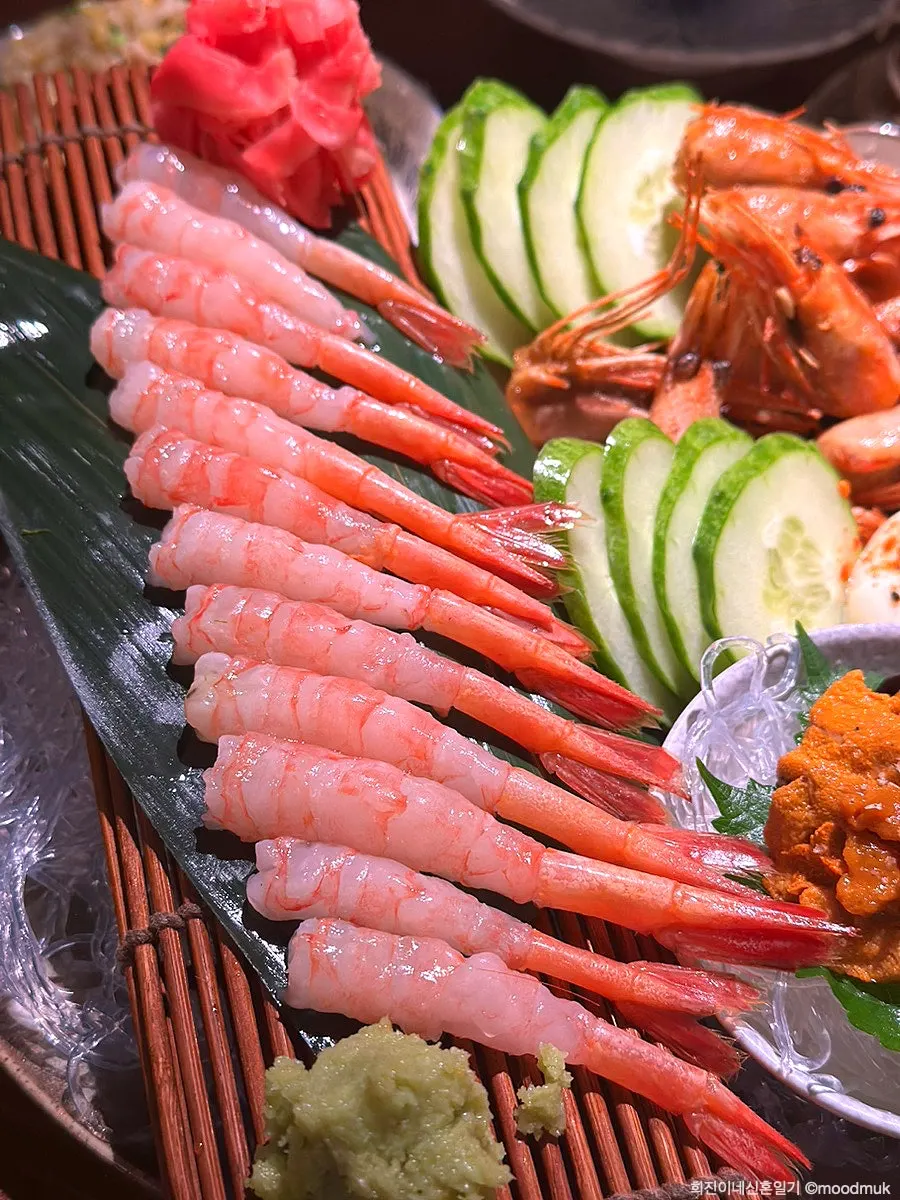 Close-up of uni and sweet shrimp