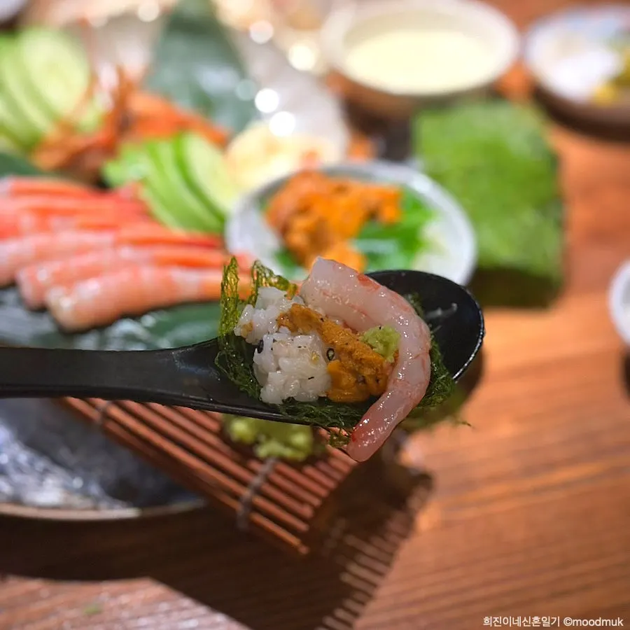 Close-up of the gamtae sweet shrimp and uni gimbap