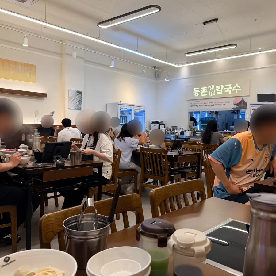 Bright, clean interior of Deungchon Shabu Kalguksu Gran Passage Branch