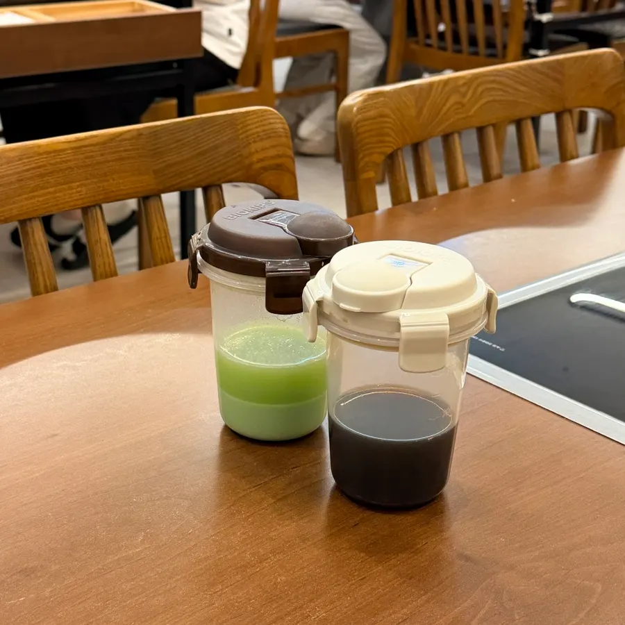 Table setting with small plates, cups, and sauce ready