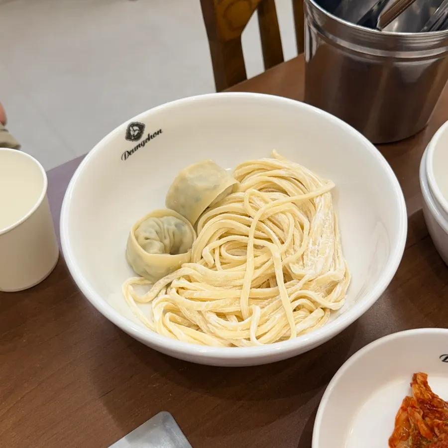 Plate of kalguksu noodles and dumplings together