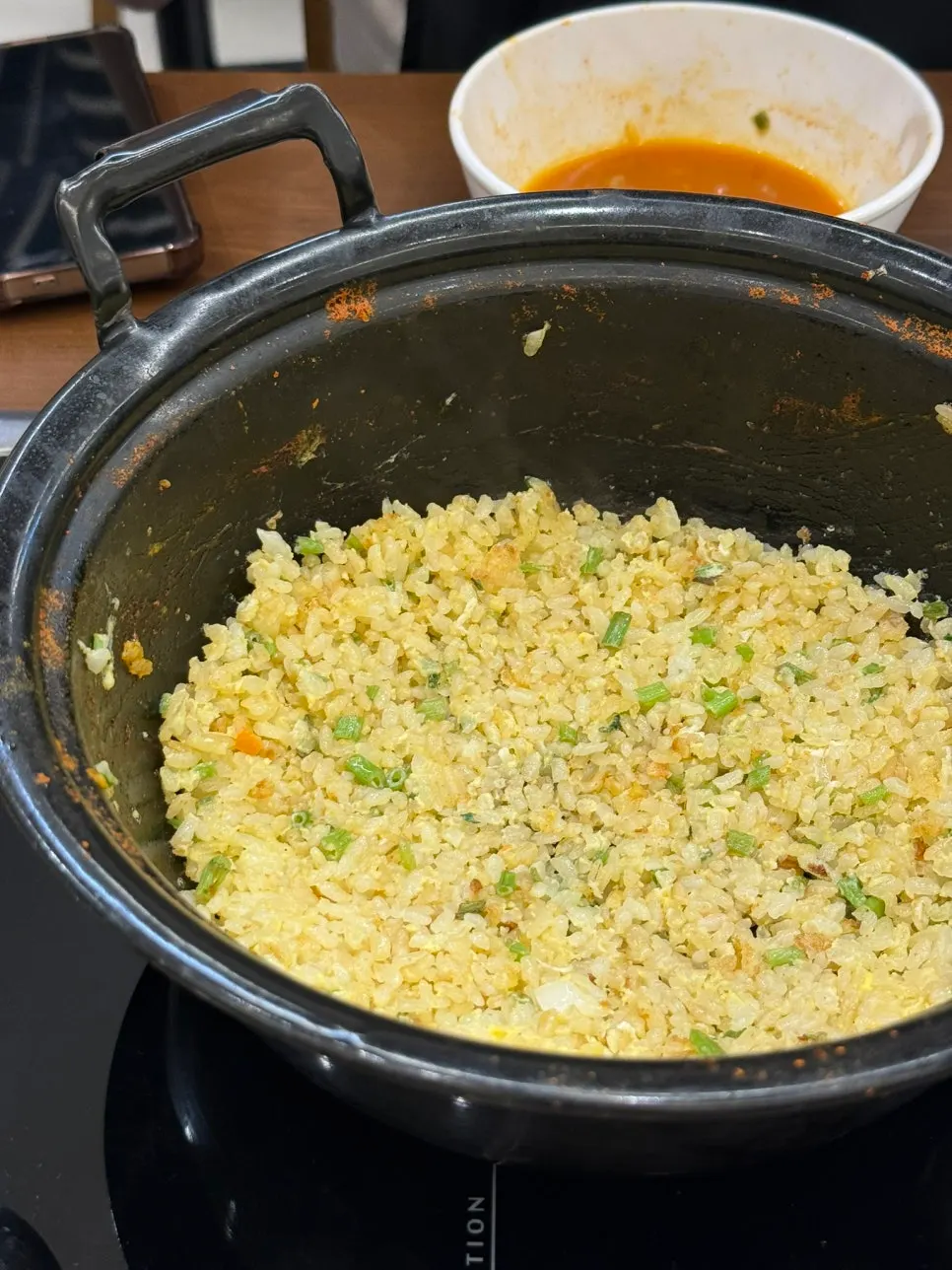 Fried rice stir-fried and served by staff