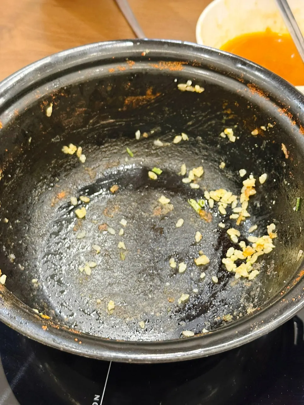 The fried rice pot scraped clean to the bottom