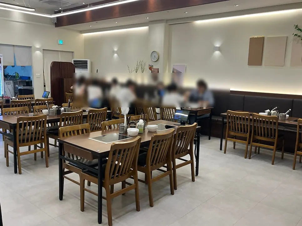 Deungchon Shabu Kalguksu interior with widely spaced tables