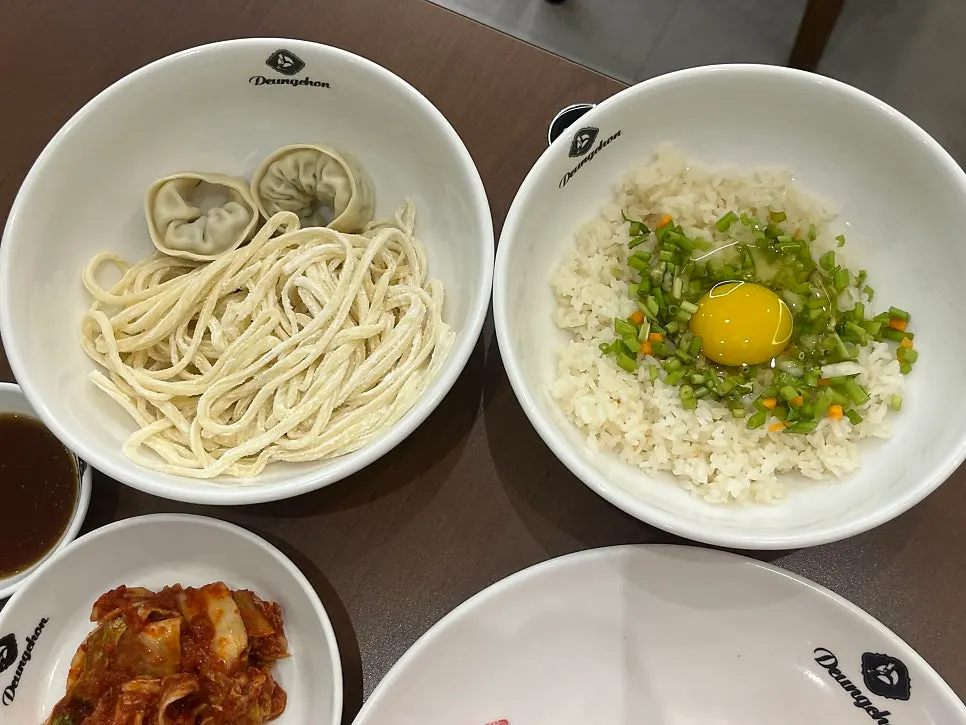 Kalguksu noodles cooking in the broth