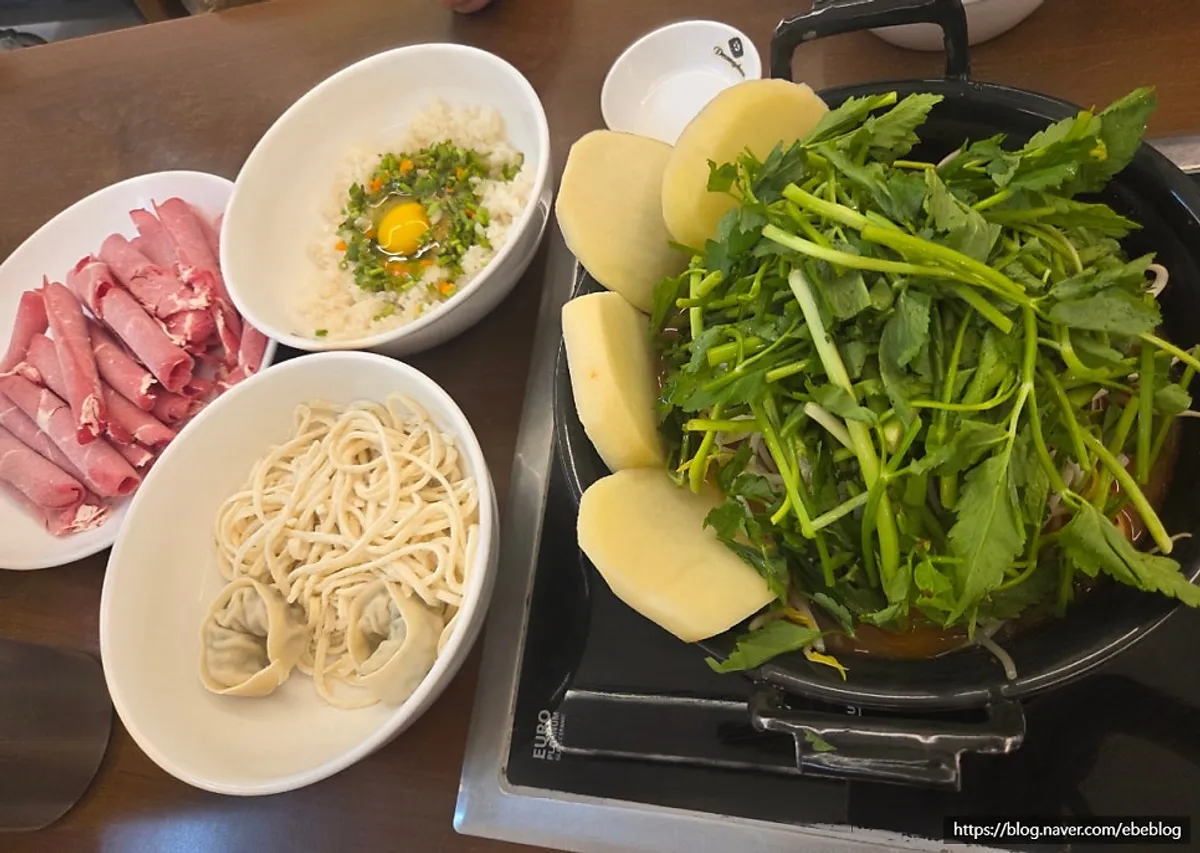 Full spread with the spicy broth shabu-shabu pot