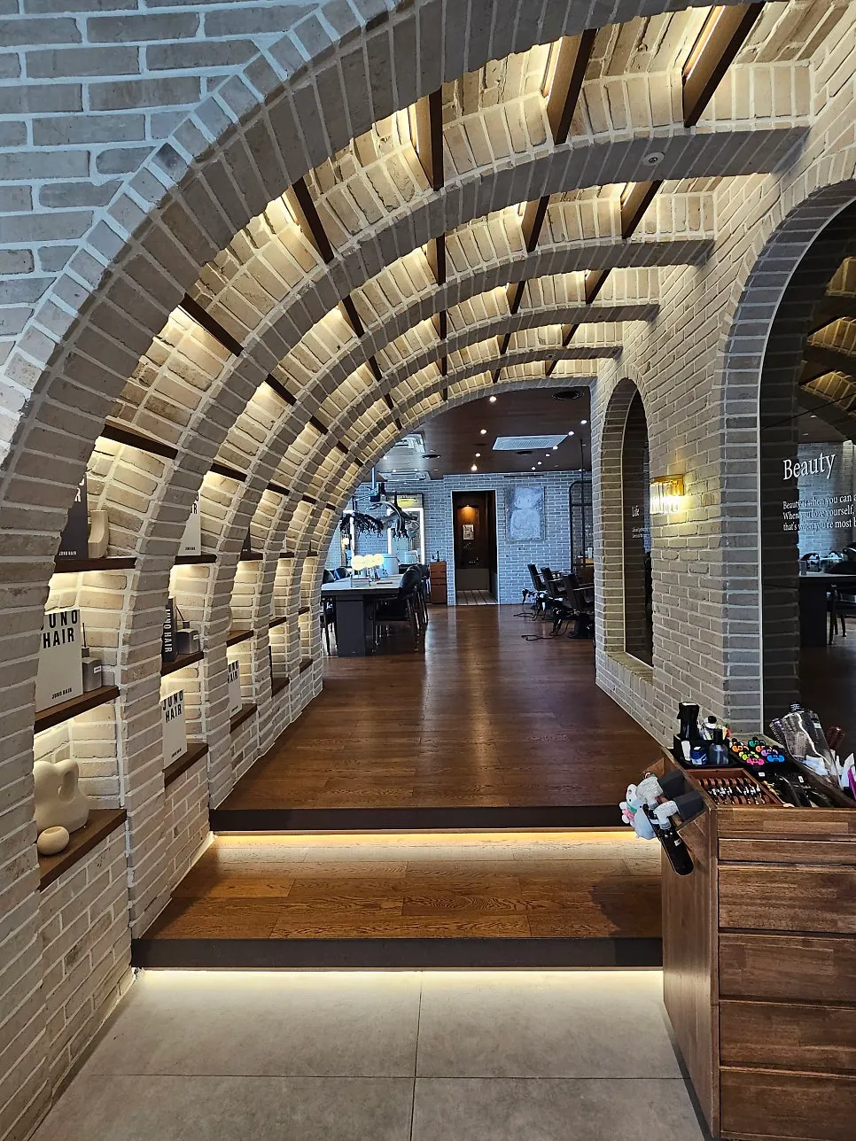 Entrance of Juno Hair Dongtan SRT Station Branch with a temple-motif interior