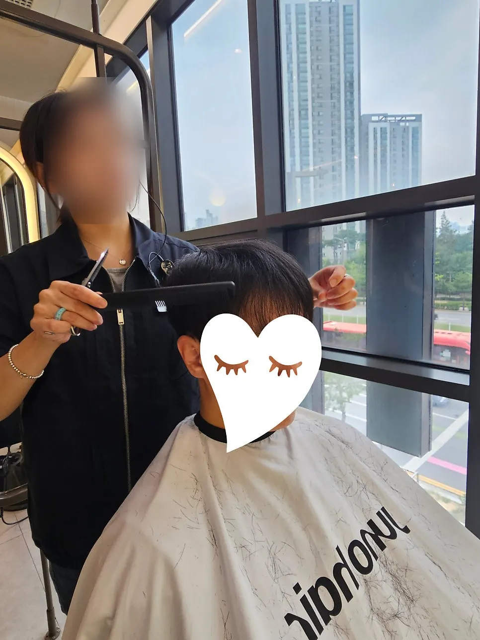Trimming the side hair length with scissors