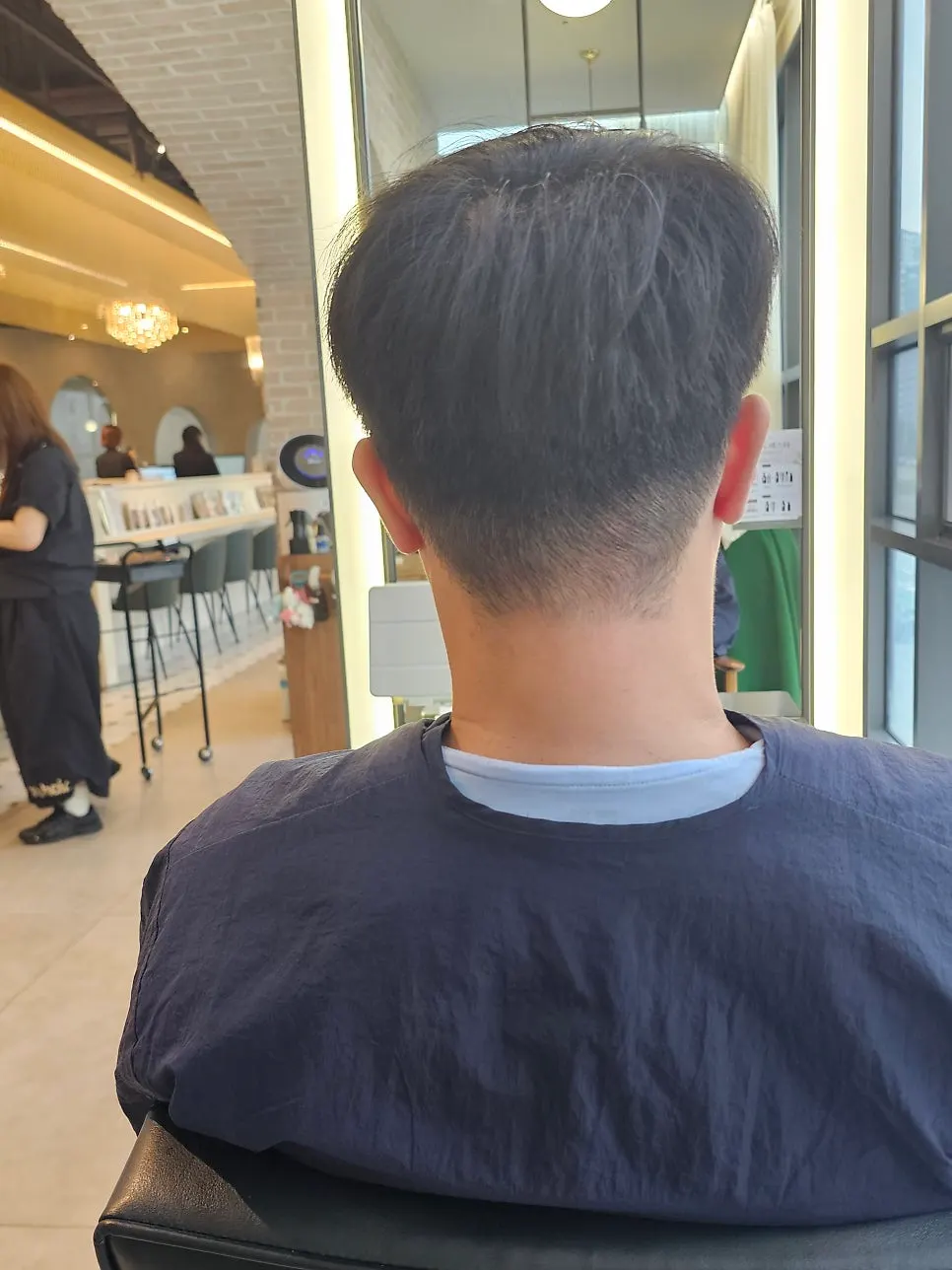 Side view of the finished men's cut