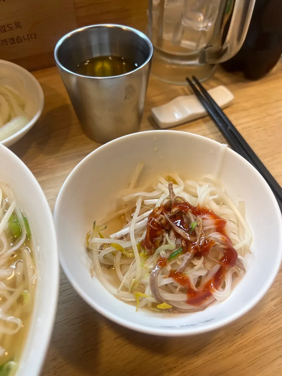 Broth and noodles of the brisket pho