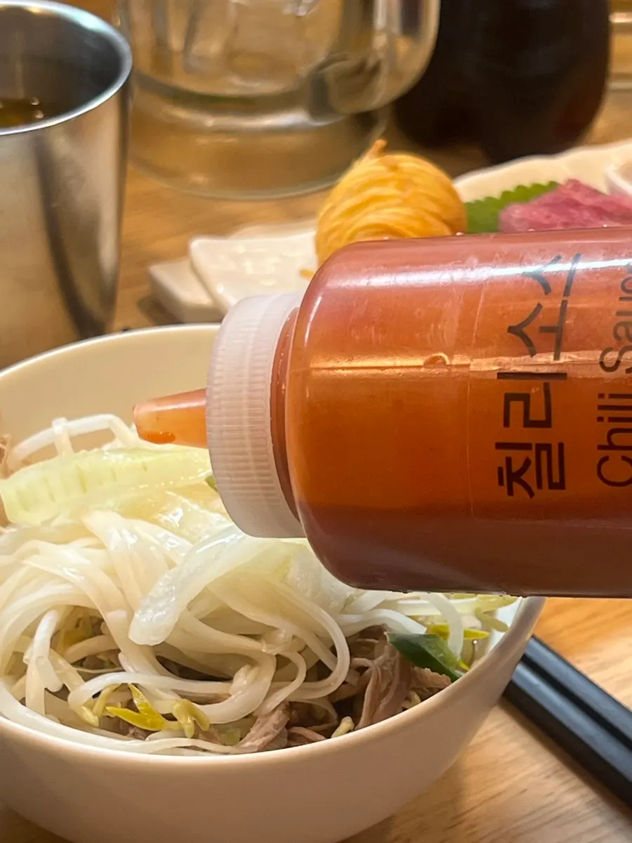 Soft brisket piled on top of the noodles
