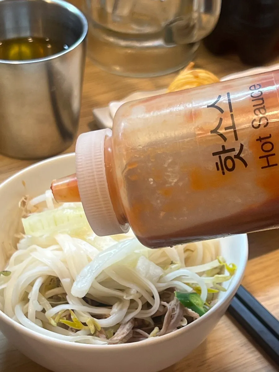 Close-up of brisket and pho noodles