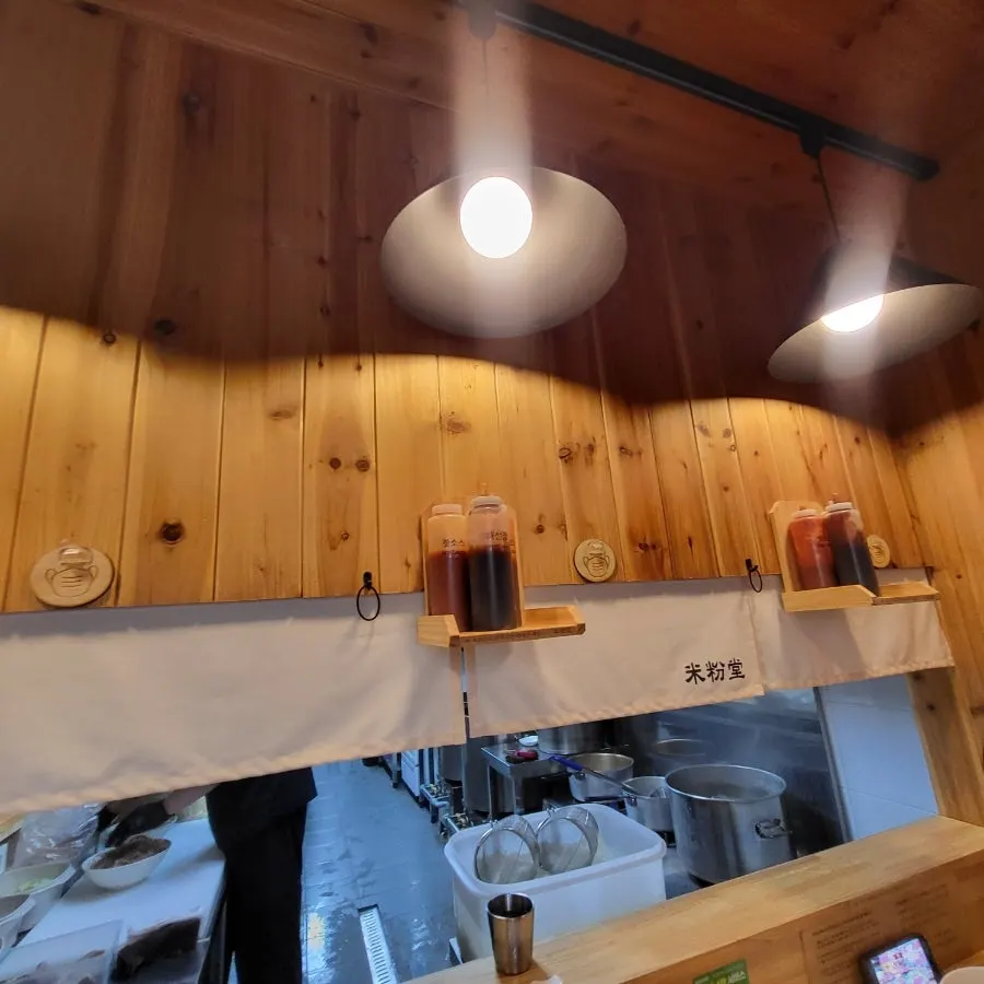 Wood-toned interior of Mibundang Dongtan Station Branch