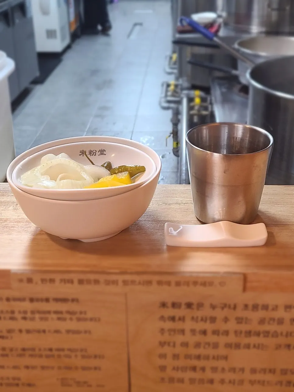 Bowls and side dishes set up at the bar-table counter seating