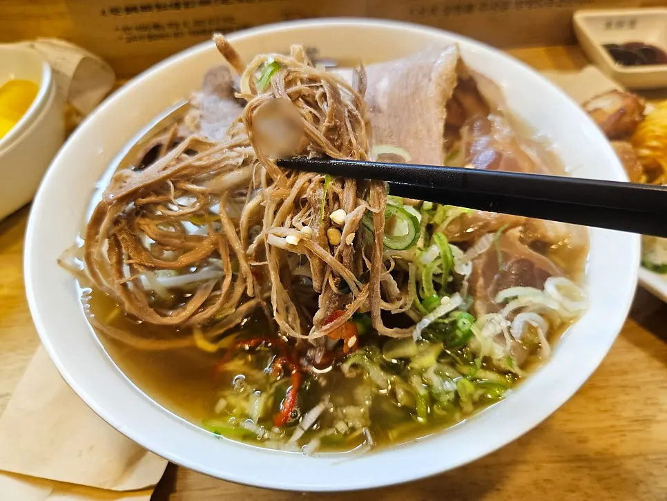 Brisket point cut topping piled so high the noodles are hidden